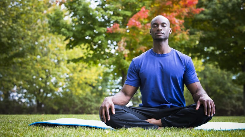 Generic photo of a man meditating outdoors (ThinkStock/PA)