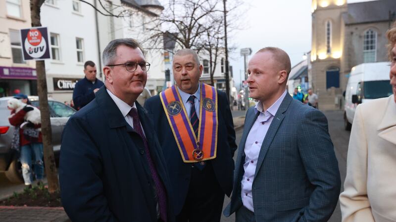 Sir Jeffrey Donaldson (left) and loyalist activist Jamie Bryson (right) during a anti Northern Ireland Protocol rally in 2022 (Liam McBurney/PA)
