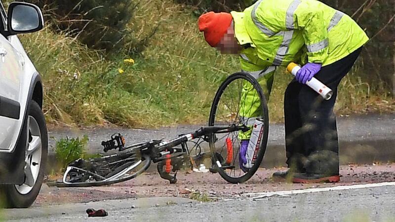 Police and forensic experts examining the scene of the fatal crash near Newtownards yesterday. Picture by Justin Kernoghan, Photopress