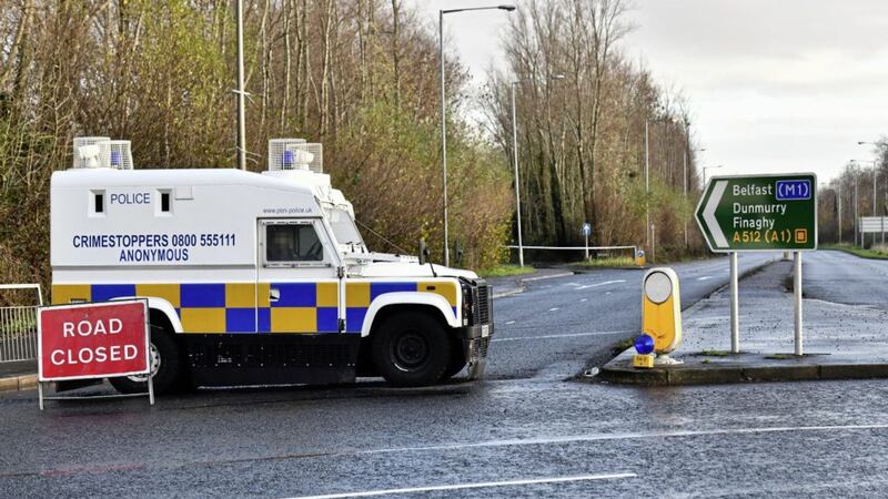 The scene of a security alert around the Old Golf Course Road area of west Belfast 