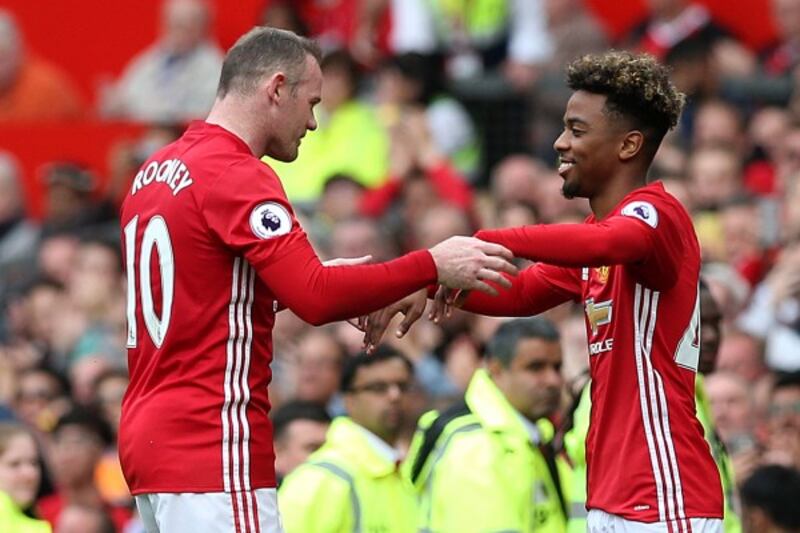 Wayne Rooney is substituted for Angel Gomes