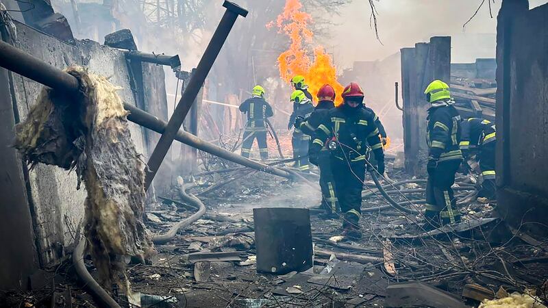 Emergency services work at the scene of a Russian attack in Odesa (Ukrainian Emergency Service via AP)