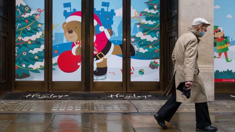 &nbsp;A man walks past closed shops on Regent Street, London which is in Tier 4, the highest tier of coronavirus restrictions. Picture by&nbsp;Dominic Lipinski/PA Wire