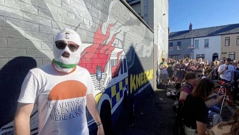 Belfast trio Kneecap with their controversial mural. Picture from Kneecap Twitter 