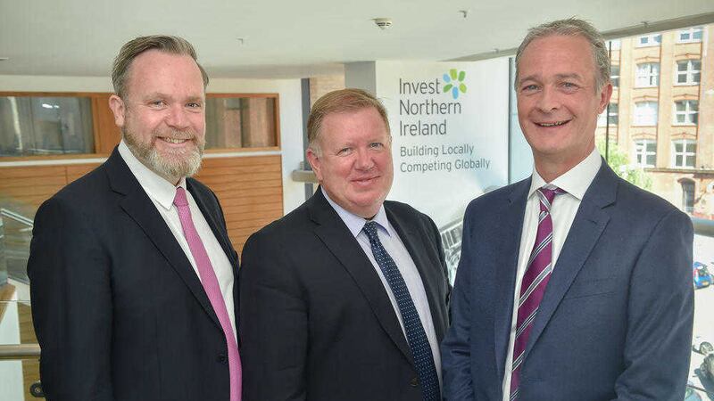 Confirming the new Codec-dss office in Northern Ireland are John Roddy (left) and Barry McLean (right) from the company with Bill Scott from Invest NI 