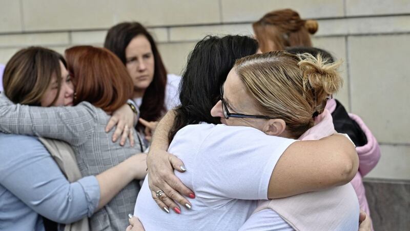 Family and friends of Jennifer Dornan embrace after Raymond O'Neill (43) was found guilty of her murder. Picture by&nbsp;Colm Lenaghan/Pacemaker