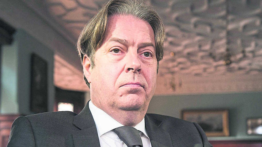 Roger Allam as Henry Stanfield in The Truth Commissioner