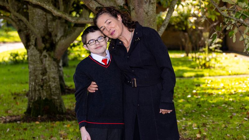 Martha McManus with son Sean McManus Allen, whose deafness prevented accurate assessment and support for additional needs (Fintan Clarke/PA)