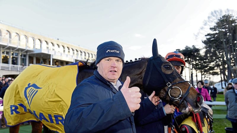Mick Jazz and trainer Gordon Elliott after their winning The Ryanair Hurdle during day four of the Leopardstown 2017 Christmas Festival at Leopardstown Racecourse. 