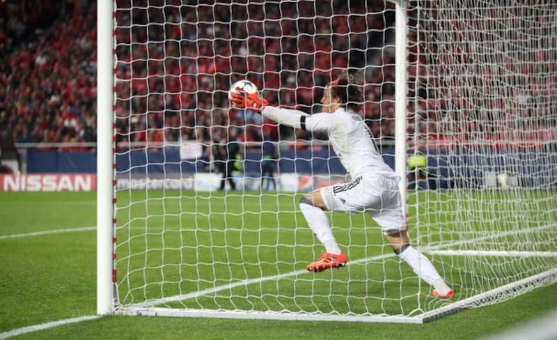 Benfica goalkeeper Mile Svilar concedes a goal in the Champions League against Manchester United