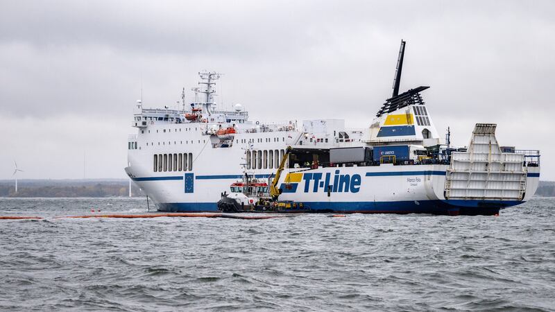 The grounded ferry Marco Polo and the tug Max are seen outside Horvik, southern Sweden, on October 26 (Johan Nilsson/TT News Agency via AP)
