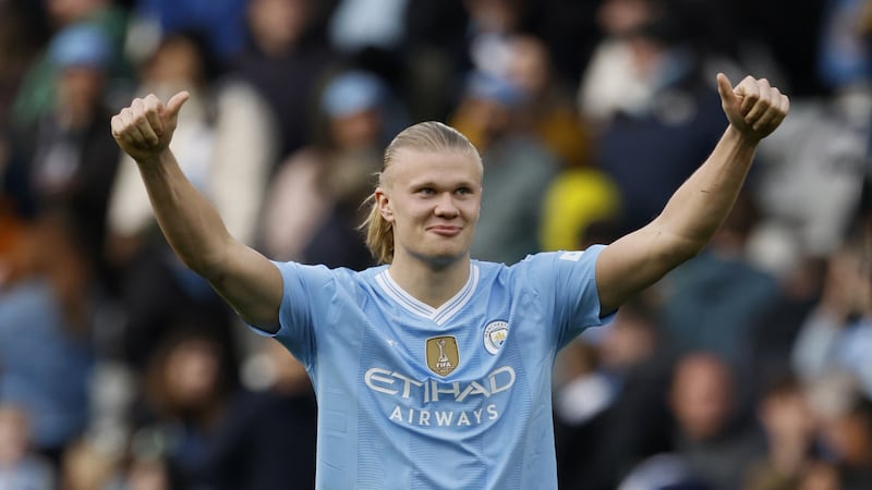 Erling Haaland salutes the fans after City’s latest win