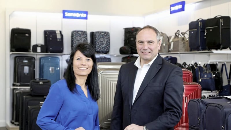 Lucy Pye, store manager of Samsonite and Chris Nelmes, centre manager of The Boulevard, announce the arrival of the luggage manufacturer to the centre in Banbridge 