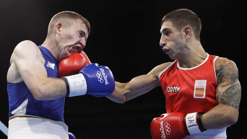 Spain's Samuel Carmona Heredia lands a blow on Paddy Barnes during Monday's fight in Rio <br />Picture by AP&nbsp;