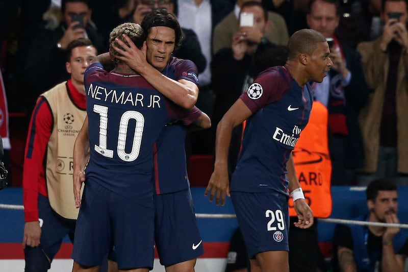 Neymar and Edinson Cavani during a Champions League game