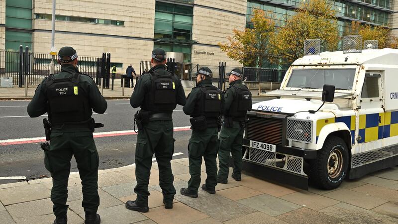 Police outside Laganside Crown Court in Belfast during the trial of James Stewart Smyth (Oliver McVeigh/PA)