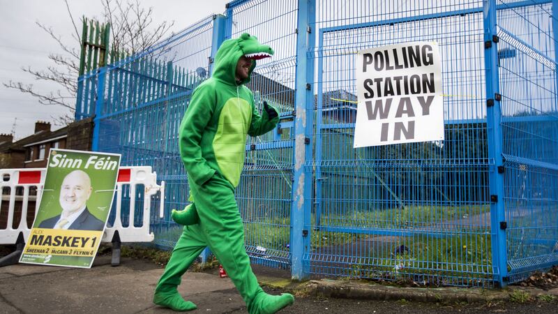 SNAPPED:&nbsp;<span style="font-family: Verdana, Arial, Helvetica, sans-serif; font-size: 13.3333px;">Irish language activist Dominic Sherry walks into a West Belfast polling station dressed in a crocodile costume to cast his vote in the Northern Ireland Assembly elections.</span><span style="font-family: Verdana, Arial, Helvetica, sans-serif; font-size: 13.3333px;">&nbsp;</span>