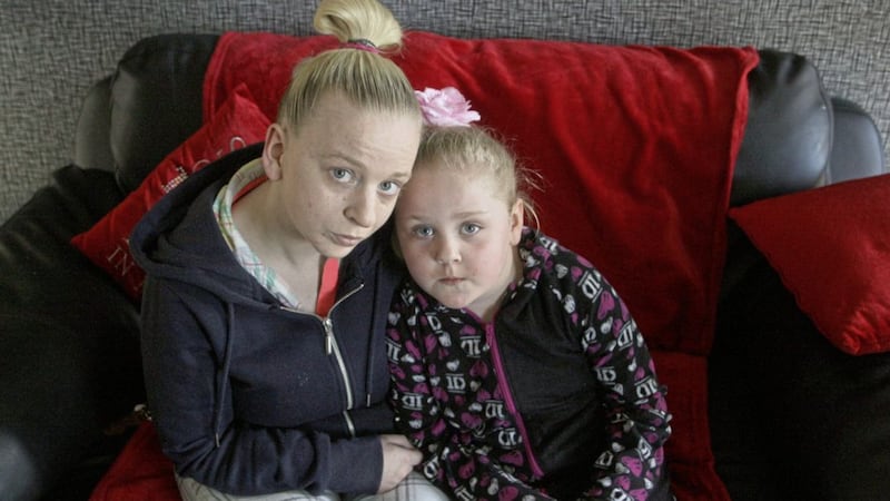 Anna Conlon and her six-year-old daughter Eileen pictured back in their home after they had been evacuated during the security alert in Ardoyne. Picture by Ann McManus 