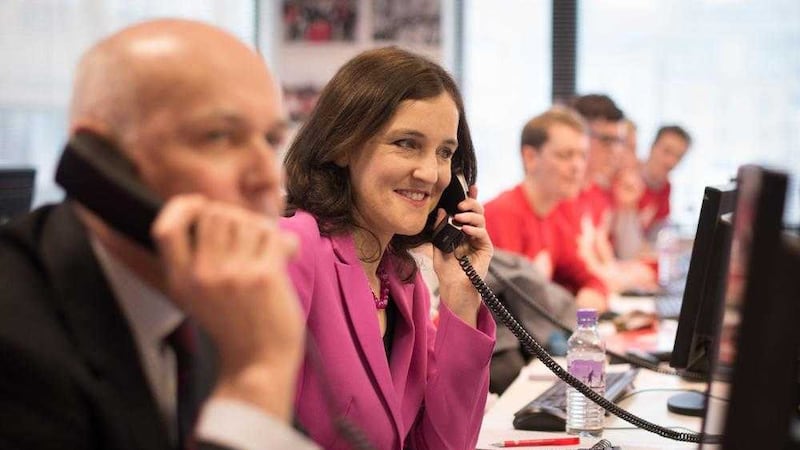 Theresa Villiers canvassing voters by phone for the Vote Leave campaign. Picture by Stefan Rousseau, Press Association