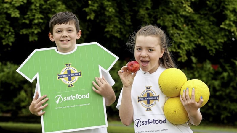 Ballymacash Primary School pupils Leon Roberts and Alana Singleton at the launch of safefood as the IFA&#39;s official safe and healthy eating partner 