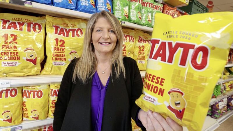 Tayto marketing director, Elly Hunter pictured with the new-look Tayto brand packaging 