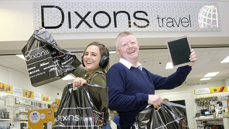 Dixons&#39; assistant manager, Joe Lunney, and Belfast international Airport&#39;s Danielle McCaughern celebrate the opening of the new store at the airport 