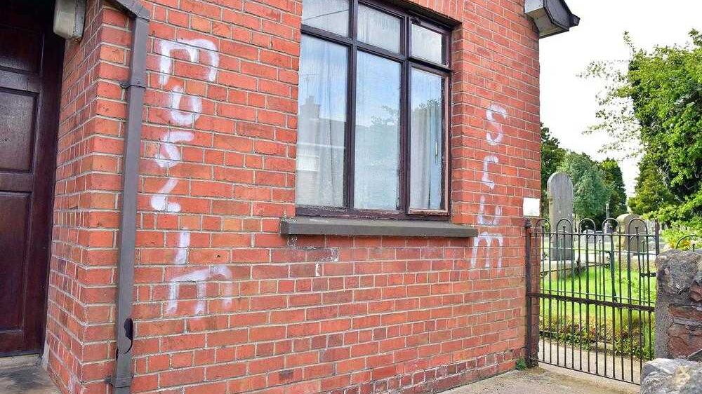A house in Dungannon, Co Tyrone, painted with racist graffiti in May. Picture by Mark Winter, Pacemaker 