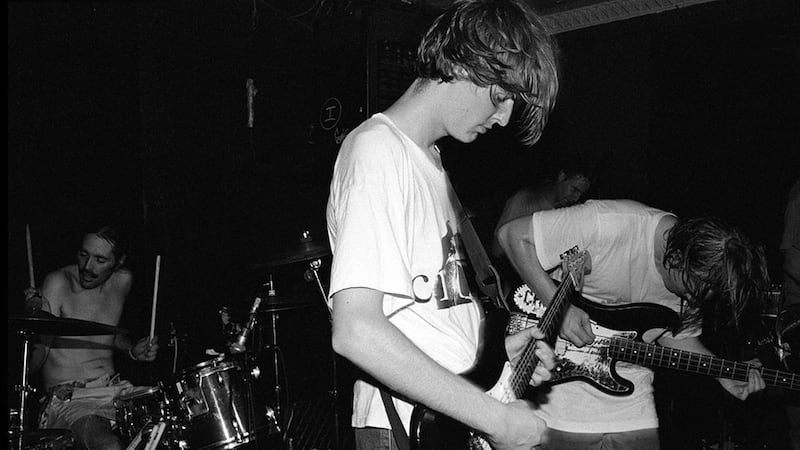 A black and white photo of Pavement playing live at at Maxwell's in New Jersey with Gary Young on drums