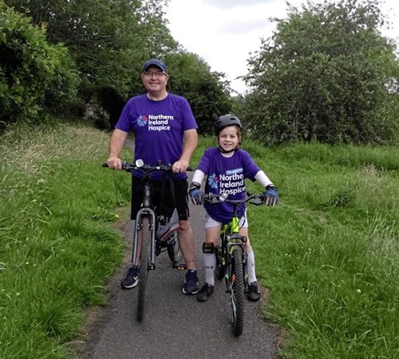 Stephen McGeown and his son Conal helped raise almost &pound;26,000 for the NI Hospice 