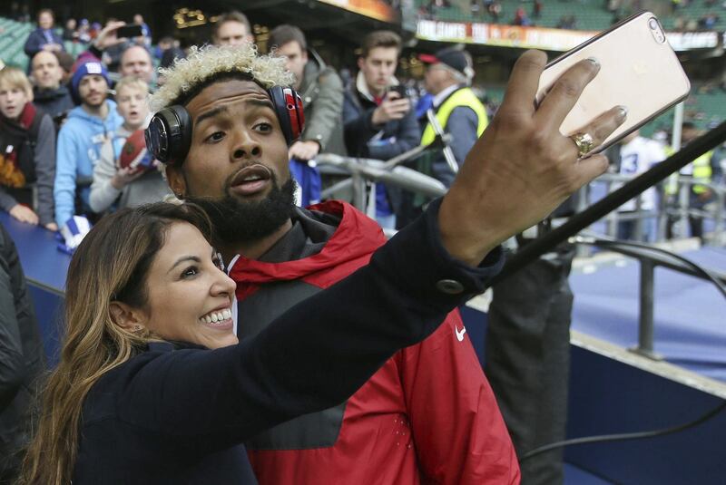 &nbsp;Odell Beckham poses for a selfie after a warm-up before an NFL football game against Los Angeles Rams at Twickenham stadium in London