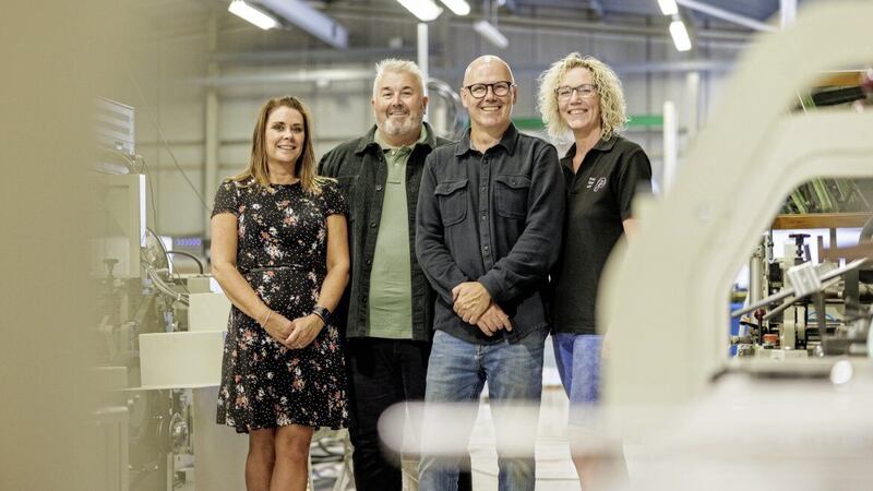 Print Library founders Michael Thompson and Geoff Truesdale with sales and account manager Jay Gregson (left) and production manager Andrea McMaster 