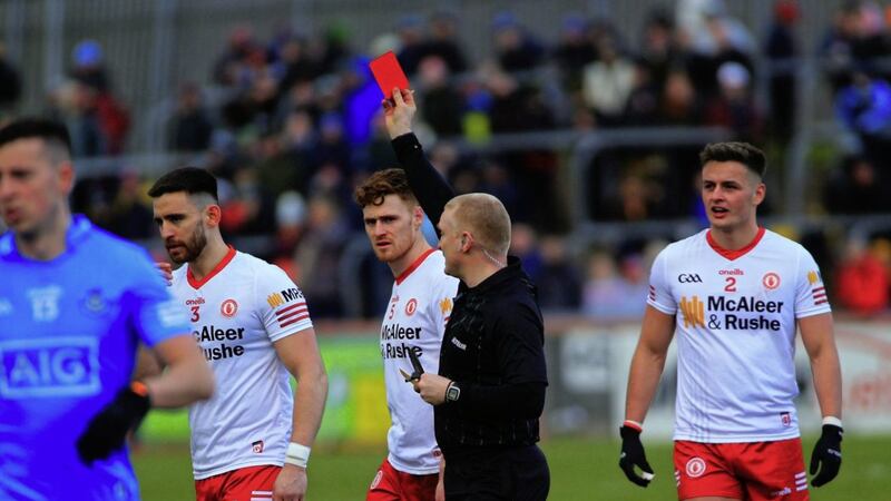 Tyrone&#39;s P&aacute;draig Hampsey is given his marching orders by referee Barry Cassidy during yesterday&#39;s game at Healy Park Picture by S&eacute;amus Loughran 