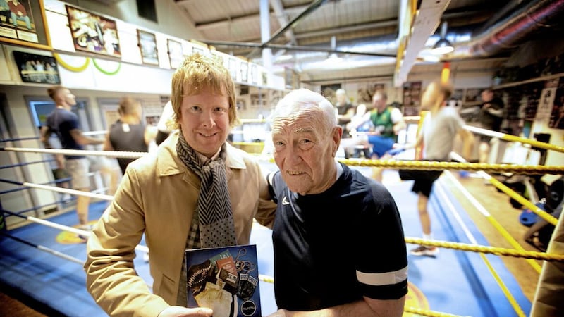 Co Down songwriter and poet Declan Murphy returned to the Holy Family gym on Tuesday to present Gerry Storey with the first press of the single he has written and recorded as a tribute to his legacy Picture by Hugh Russell 