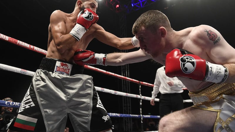 Paddy Barnes tussles with Stefan Slavchev on his way to victory in his first professional fight&nbsp;