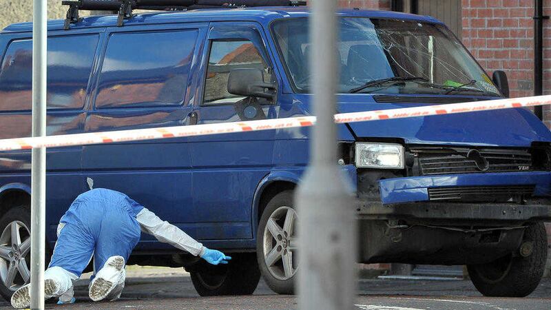 Police forensic experts at work after the bomb attack on Adrian Ismay. Picture by Justin Kernoghan 