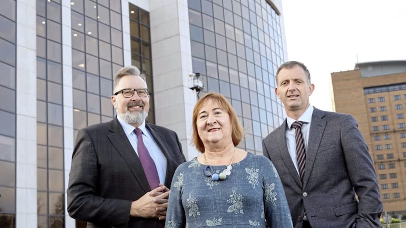 L-R: PwC&#39;s head of regions Paul Terrington announcing plans to create 600 jobs in Belfast with DfE Deputy Secretary Heather Cousins and Ian McConnell, PwC partner. Picture by Picture by Darren Kidd /Press Eye 