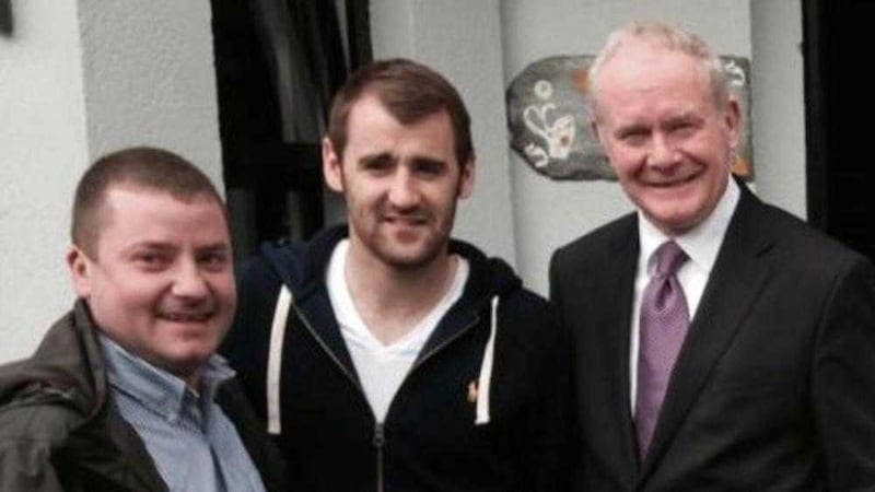 Sinn F&eacute;in councillor Ciaran Beattie, left, with footballer Niall McGinn and Deputy First Minister Martin McGuinness 