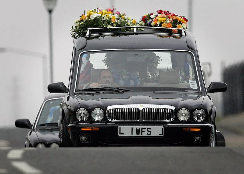 The funeral cortege of Steven Colwell makes its way out of the Forthriver estate in north Belfast