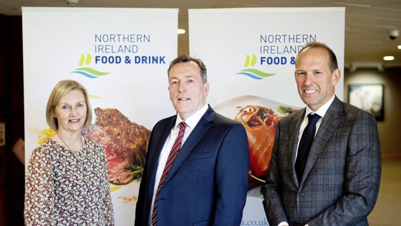 New NIFDA chair George Mullan (centre) with outgoing chair Nick Whelan (right) and new vice-chair Ursula Lavery (left). 