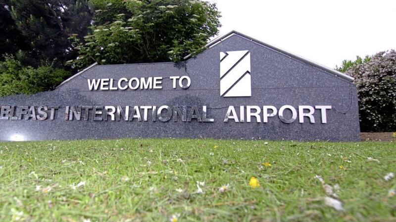 Security staff at Belfast International Airport have been told not to wear poppies beating British army and RUC insignia  