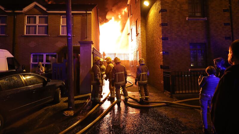 &nbsp;<span style="font-family: Verdana, Arial, Helvetica, sans-serif; font-size: 13.3333px;">Firefighters dampen nearby homes as a bonfire at Ravenscroft Avenue in Belfast is lit ahead of the key date in the protestant loyal order marching season - the Twelfth of July.</span><span style="font-family: Verdana, Arial, Helvetica, sans-serif; font-size: 13.3333px;">&nbsp;</span><span style="font-family: Verdana, Arial, Helvetica, sans-serif; font-size: 13.3333px;">PA Wire</span>