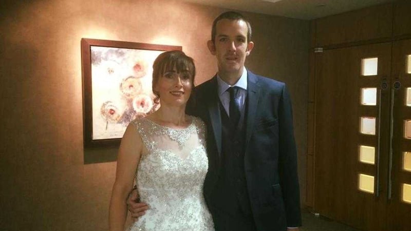 Jonathan Peden pictured with his wife Roisin on their wedding day last month 