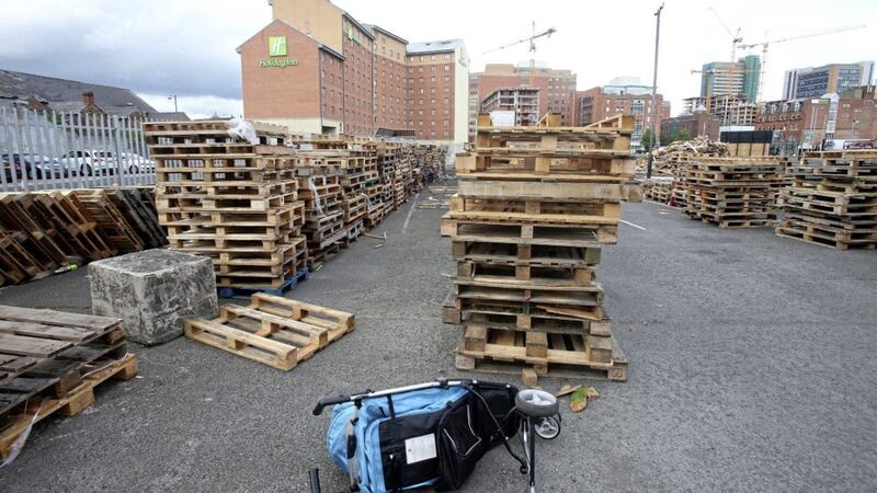 Pallets being collected for a loyalist bonfire near the Holiday Inn in central Belfast. Picture by Mal McCann 