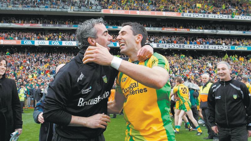 Donegal manager Jim McGuinness and Rory Kavanagh celebrate together after the county's 2012 All-Ireland final victory&nbsp;
