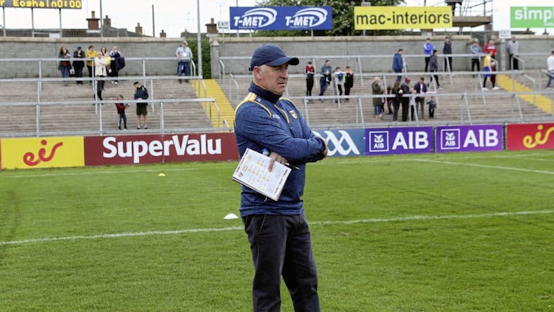 Antrim senior football manager Lenny Harbinson in front of a sparse support in Armagh, partly due to the unavailability of Casement Park.<br /> Picture Seamus Loughran