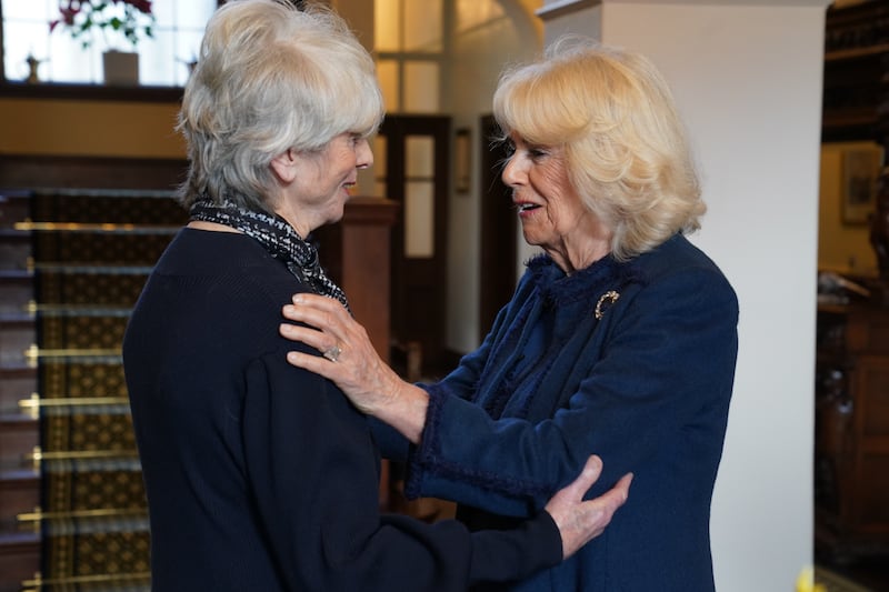 Queen Camilla (right) meets Diana Parkes CBE who founded Joanna Simpson Foundation, during a visit to Government House, in Onchan, Isle of Man