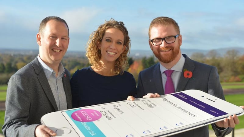 Simon Hamilton, right announced London company Moo.la Systems is setting up a centre in Belfast. He is pictured with co-founders Gemma Godfrey and Andrew Jordan 