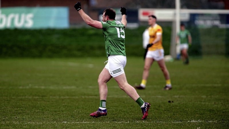 Sean Quigley celebrates at the final whistle in Corrigan Park last Saturday having scored a dramatic goal in stoppage-time Picture: Seamus Loughran. 