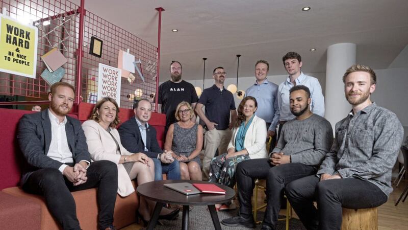 The founders from the teams on the 2018 Ignite NI Accelerator programme with Invest NI&rsquo;s Tracey Meharg, executive director of business solutions (centre), and Ignite&rsquo;s CEO Tristan Watson (right). 