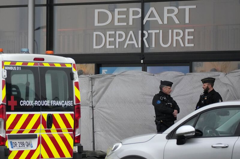 Gendarmes guard the closed entrance of Vatry Airport (Christophe Ena/AP)